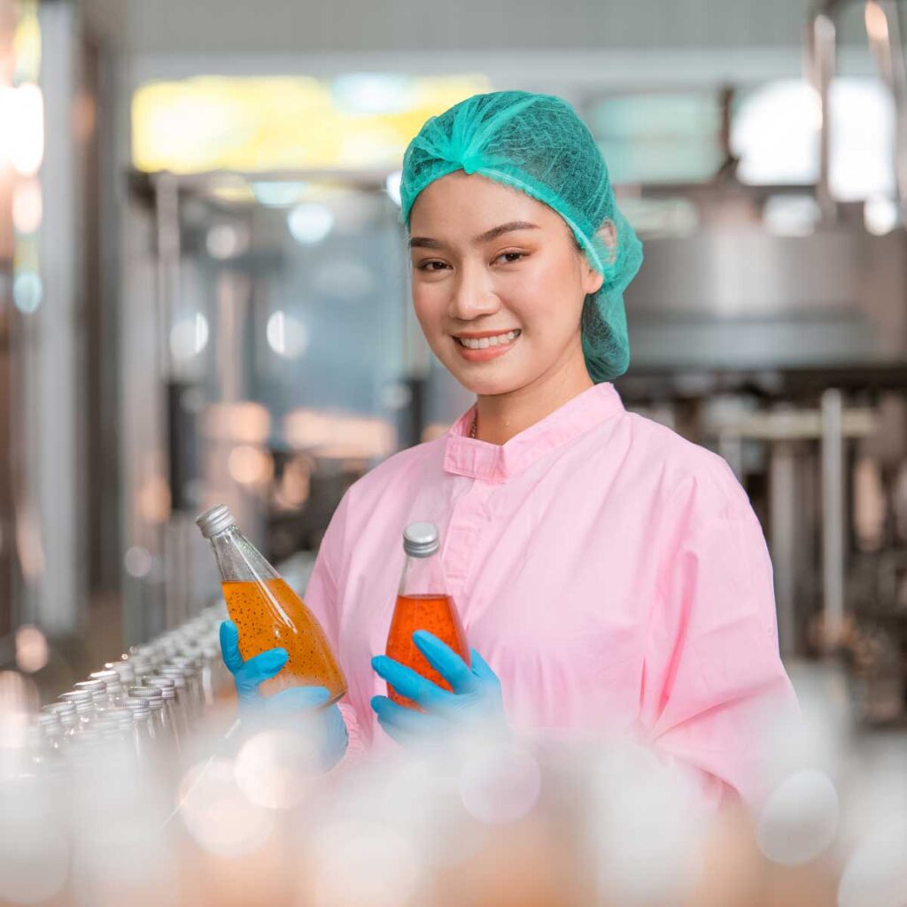 Asian woman employee working Food quality control